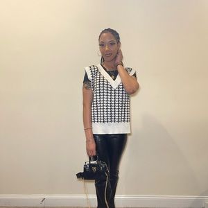 Black and white vest